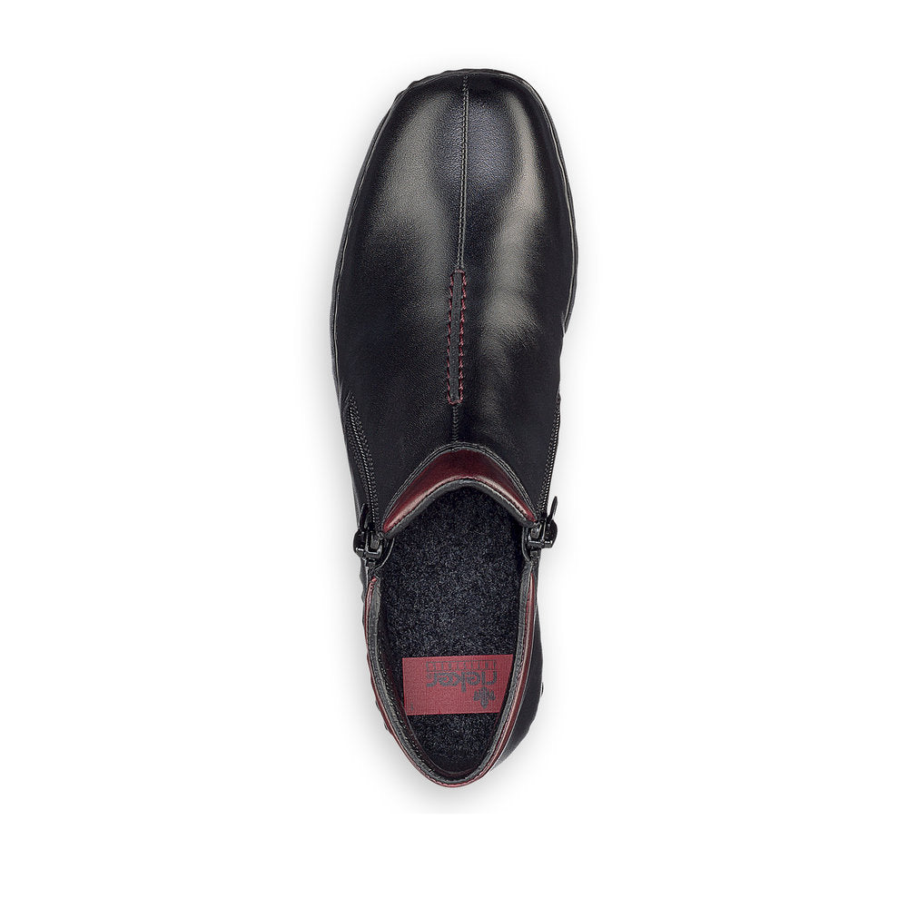 Rieker L3882-00 women's black leather zip up ankle boots, top view.