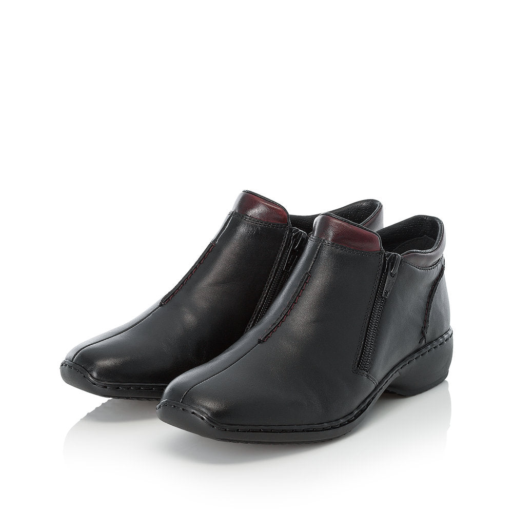 Rieker L3882-00 women's black leather zip up ankle boots, paired three-quarter view.