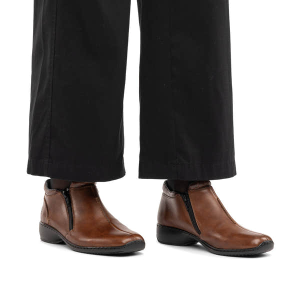 Rieker L3882-24 women's brown leather twin zip ankle boots, on-foot lifestyle view.