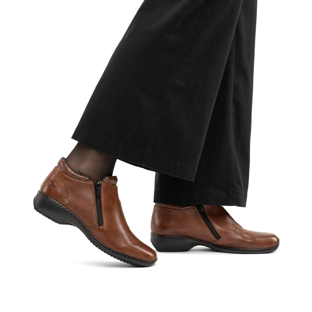Rieker L3882-24 women's brown leather twin zip ankle boots, lifestyle view 1 of 4.