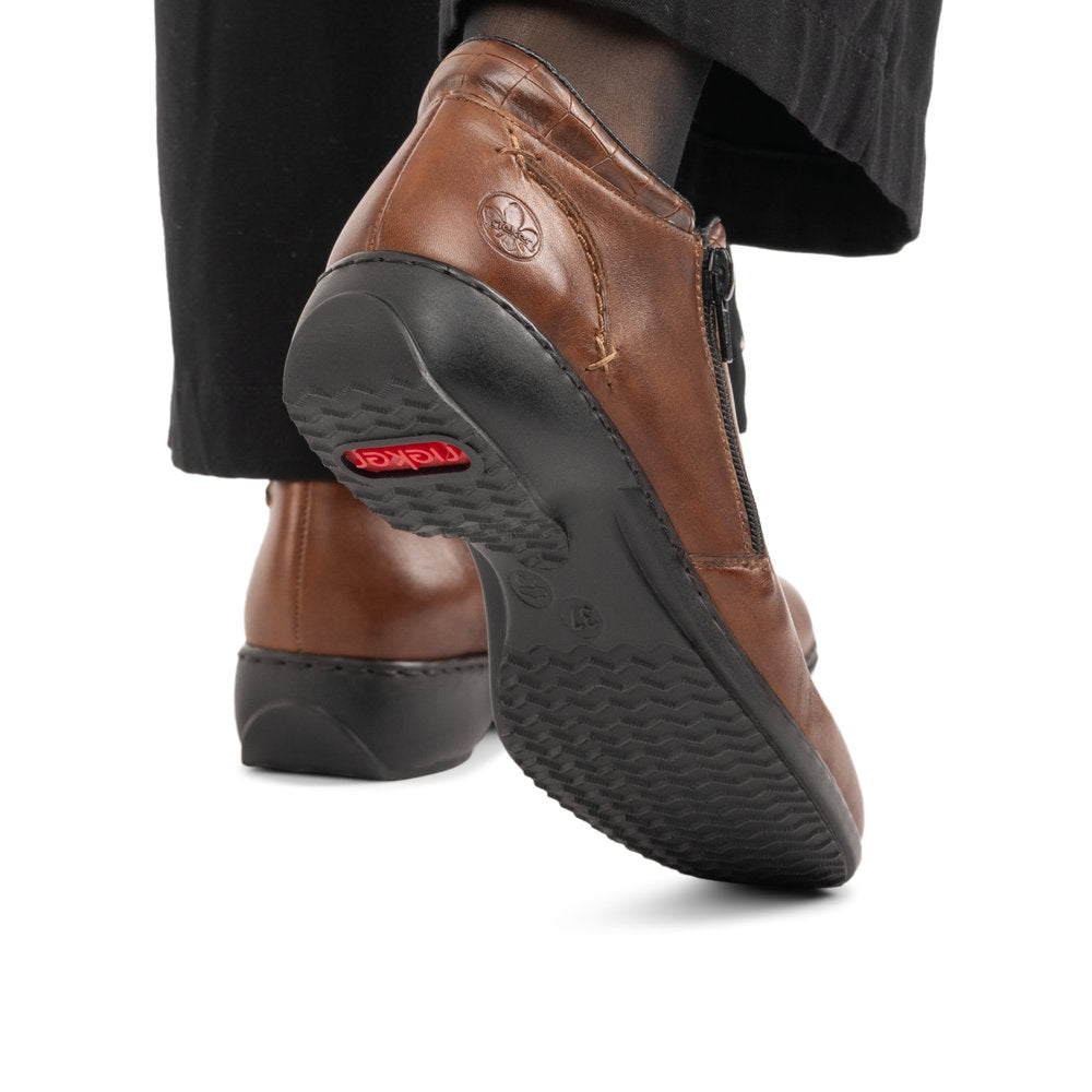 Rieker L3882-24 women's brown leather twin zip ankle boots, lifestyle view 3 of 4.