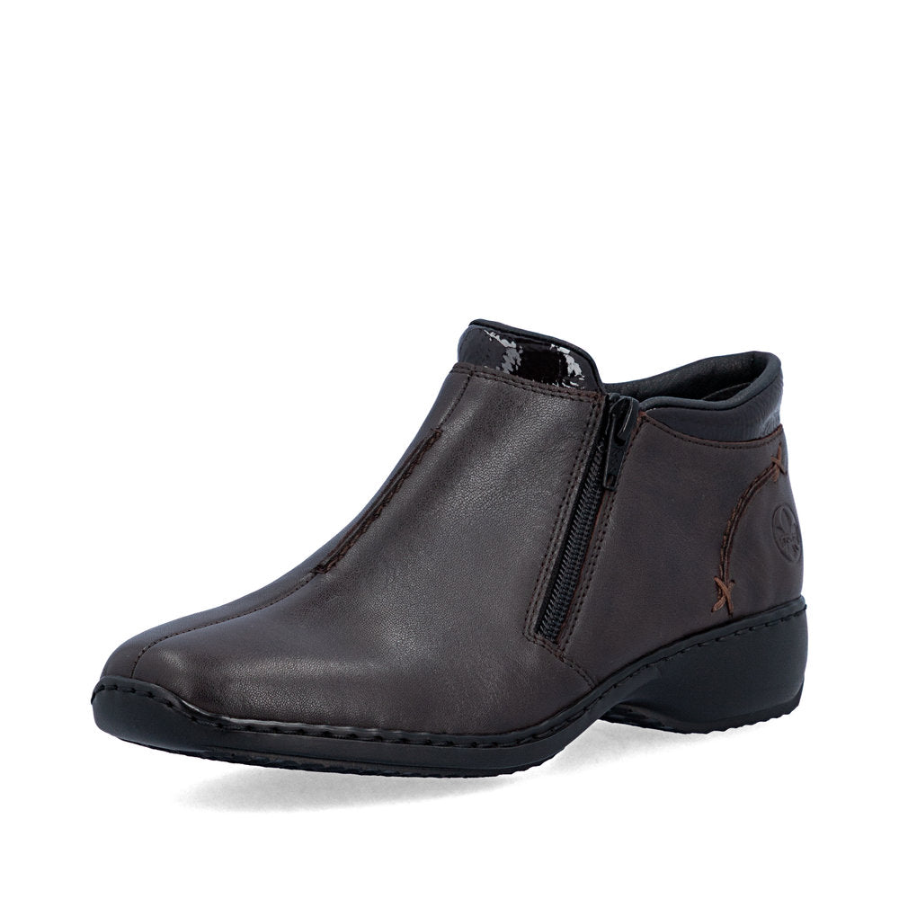 Rieker L3882-25 women's narrow brown leather side zip ankle boots, front three-quarter view.
