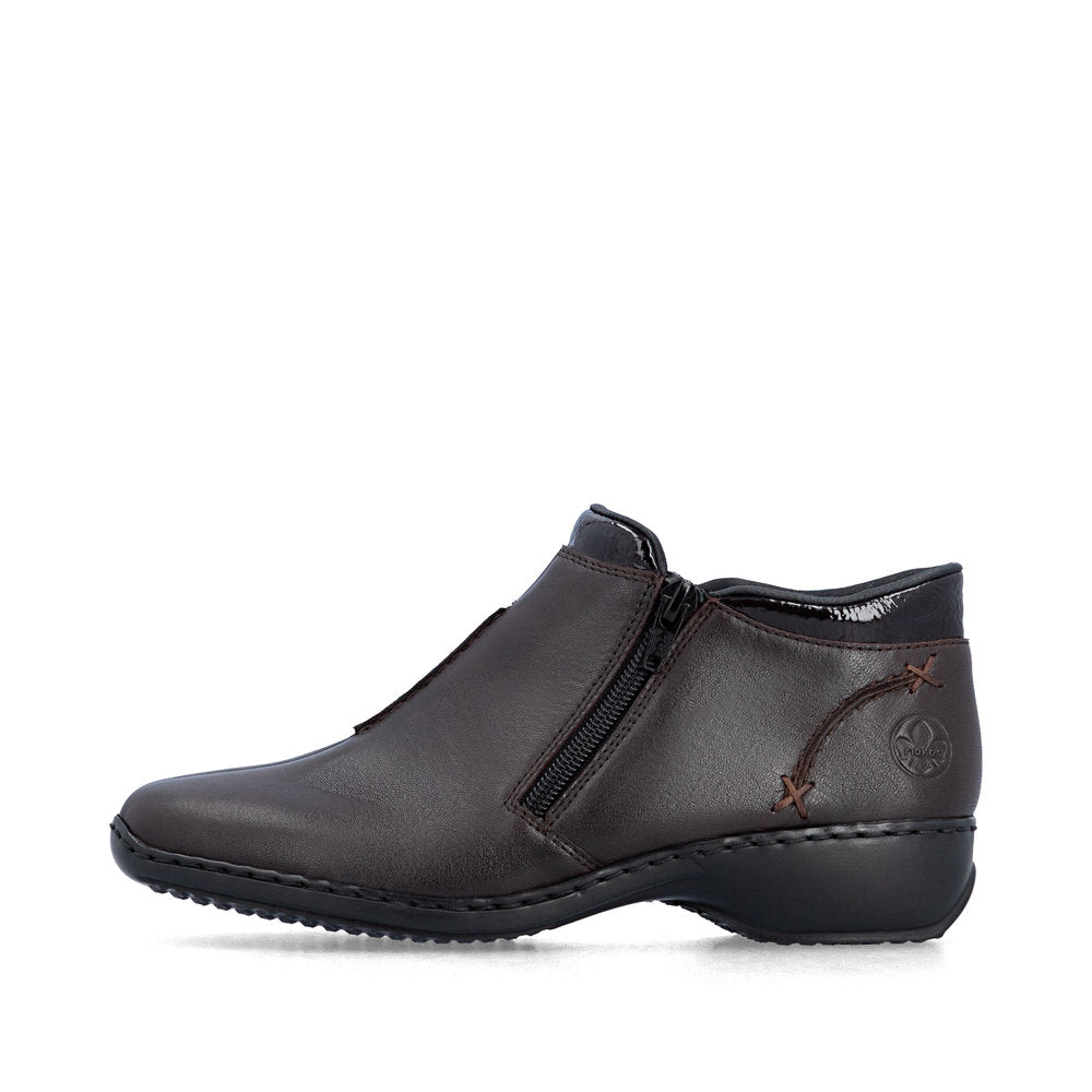 Rieker L3882-25 women's narrow brown leather side zip ankle boots, inner side view.