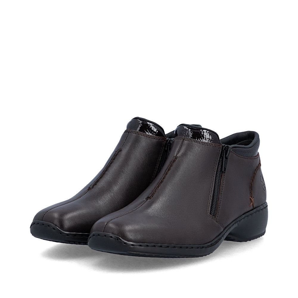 Rieker L3882-25 women's narrow brown leather side zip ankle boots, paired three-quarter view.
