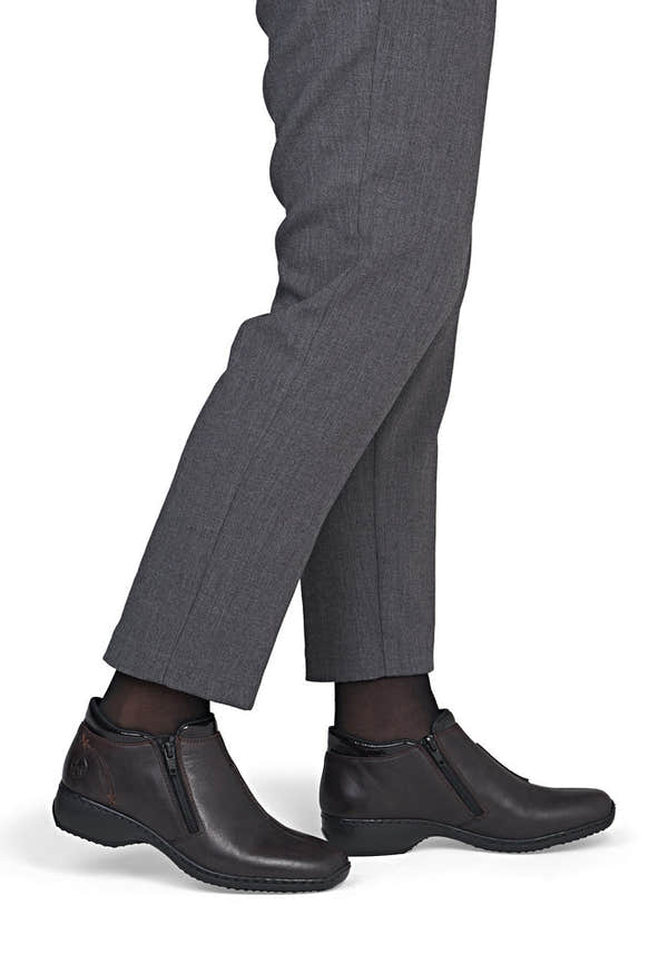 Rieker L3882-25 women's narrow brown leather side zip ankle boots, on-foot lifestyle view.