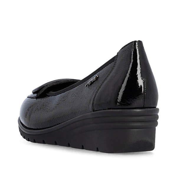 Rieker L5362-00 women's black slip on shoes, rear three-quarter view.