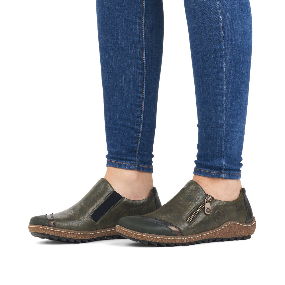 Rieker L7571-54 women's green combi leather water resistant side zip shoes, on-foot lifestyle view.