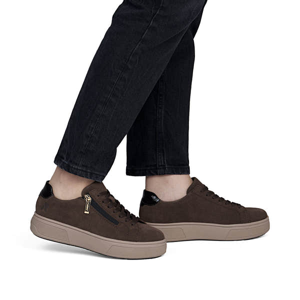 Rieker M7701-25 women's brown suede zip & lace trainers, on-foot lifestyle view.