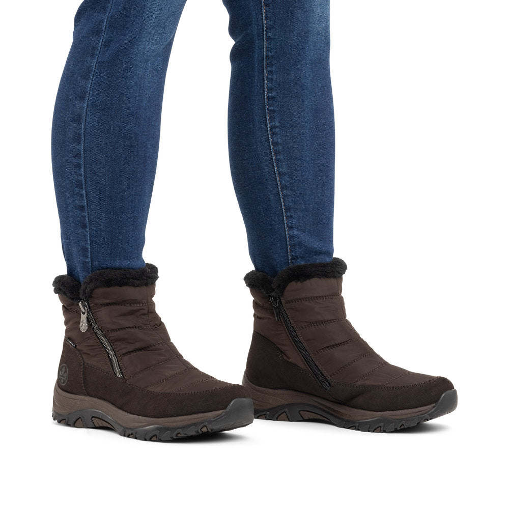 Rieker M9670-25 women's wide brown textile water resistant side zip ankle boots, on-foot lifestyle view.