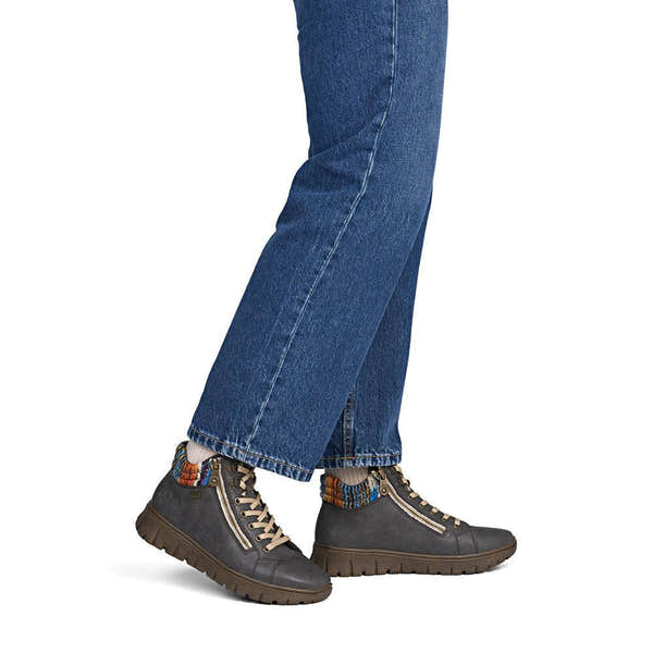 Rieker N1305-45 women's wide grey leather water resistant zip & lace ankle boots, on-foot lifestyle view.