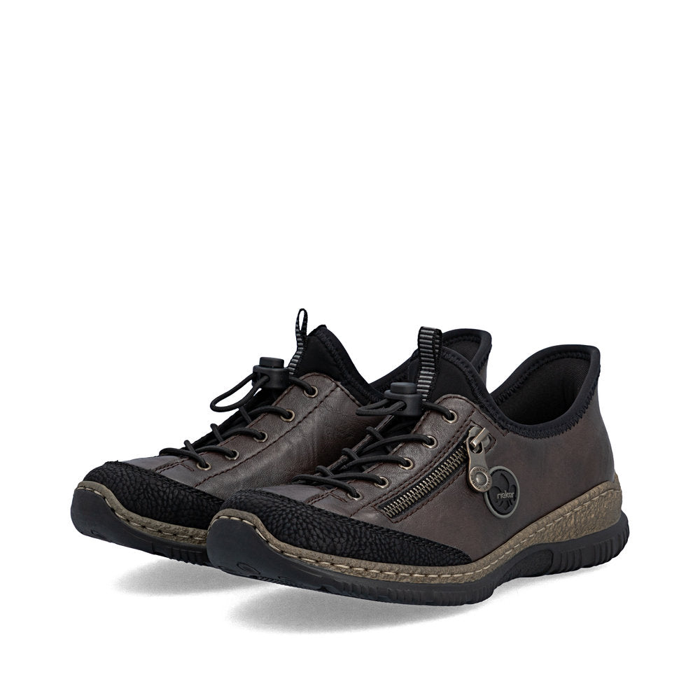 Rieker N3267-25 women's black elasticated shoes, paired three-quarter view.