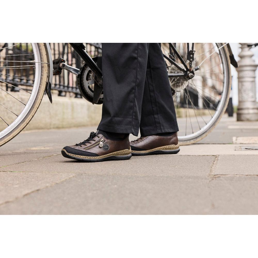 Rieker N3267-25 women's black elasticated shoes, lifestyle view 4 of 7.