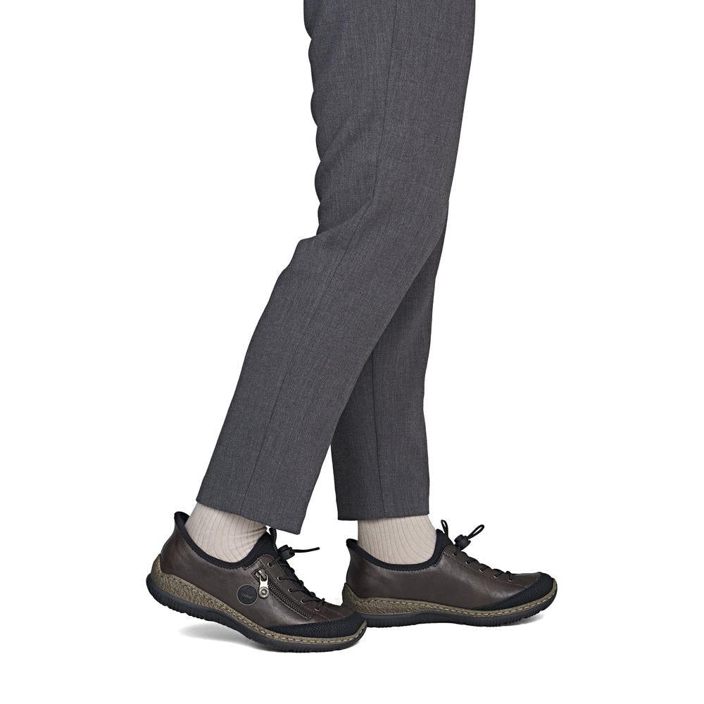 Rieker N3267-25 women's black elasticated shoes, on-foot lifestyle view.