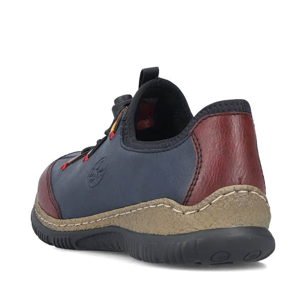Rieker N3271-35 women's blue combination slip on shoes, rear three-quarter view.