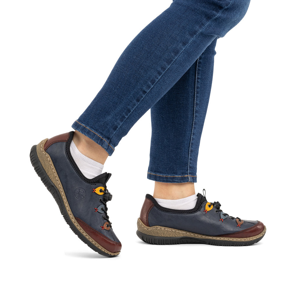 Rieker N3271-35 women's blue combination slip on shoes, lifestyle view 1 of 4.