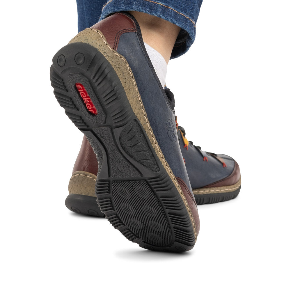 Rieker N3271-35 women's blue combination slip on shoes, lifestyle view 3 of 4.