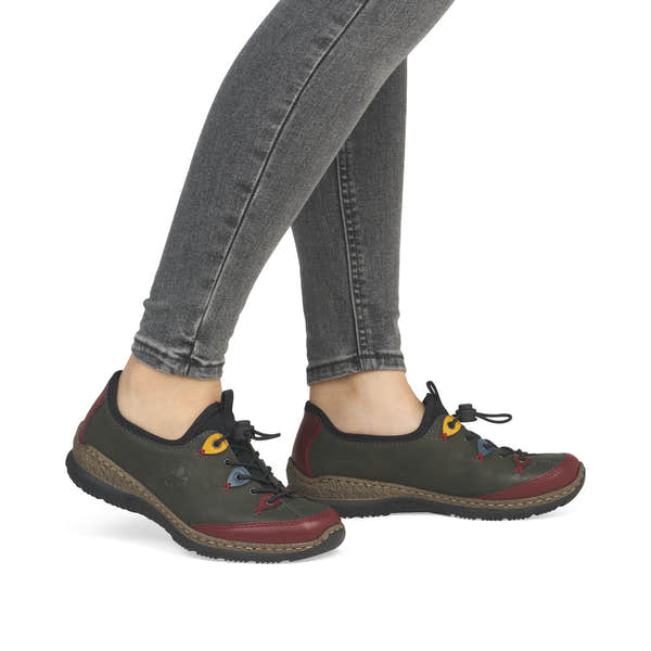 Rieker N3271-54 women's forest green slip on shoes, on-foot lifestyle view.