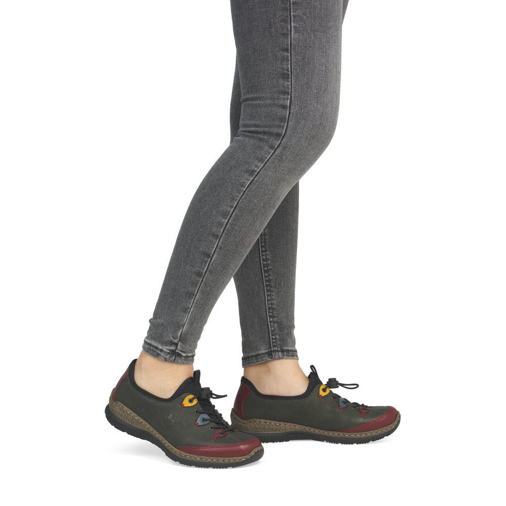 Rieker N3271-54 women's forest green slip on shoes, on-foot lifestyle view.