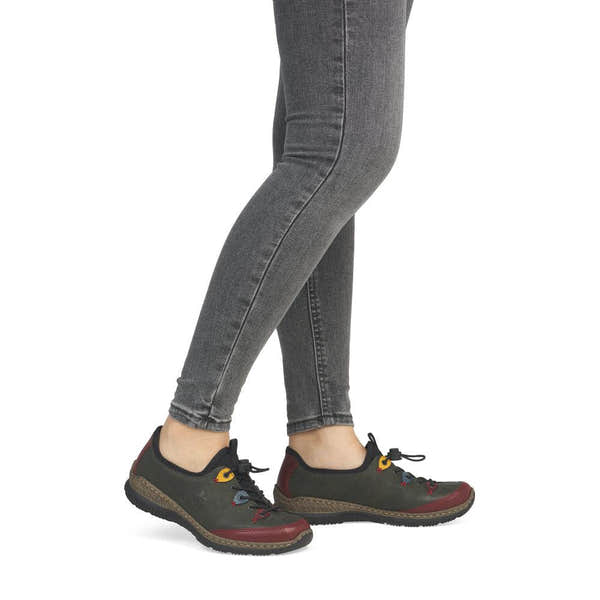 Rieker N3271-54 women's forest green slip on shoes, on-foot lifestyle view.