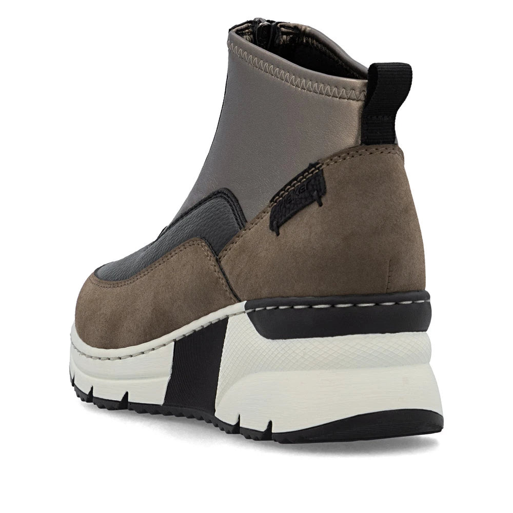 Rieker N6352-25 women's brown textile front zip ankle boots, rear three-quarter view.