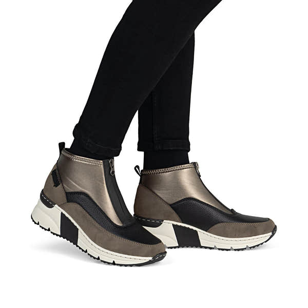 Rieker N6352-25 women's brown textile front zip ankle boots, on-foot lifestyle view.