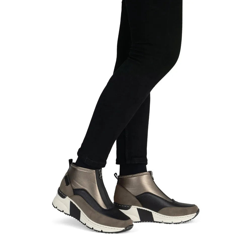 Rieker N6352-25 women's brown textile front zip ankle boots, on-foot lifestyle view.