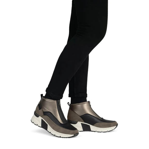 Rieker N6352-25 women's brown textile front zip ankle boots, on-foot lifestyle view.