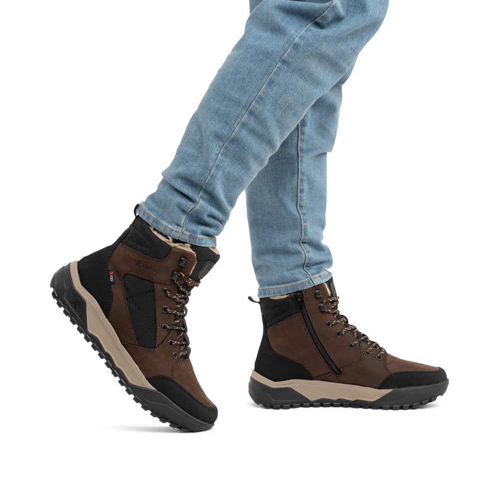 Rieker U1510-25 men's wide brown/black leather & textile water resistant lace up ankle boots, lifestyle view 1 of 4.