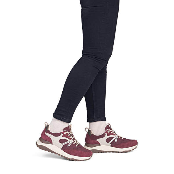 Rieker W2501-35 women's bordeaux leather water resistant lace up trainers, on-foot lifestyle view.