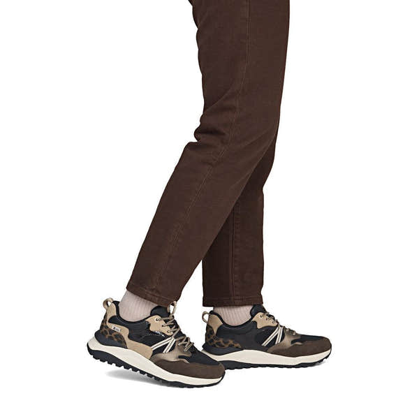 Rieker W2501-90 women's multi leather water resistant lace up trainers, on-foot lifestyle view.
