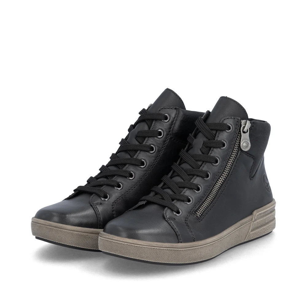 Rieker X0709-01 women's black leather zip & lace ankle boots, paired three-quarter view.