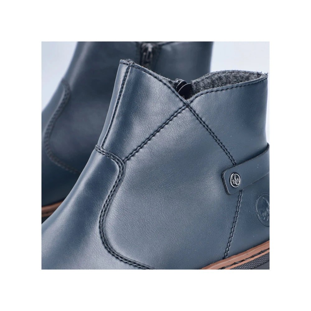 Rieker X9164-14 women's blue side zip ankle boots, lifestyle view.