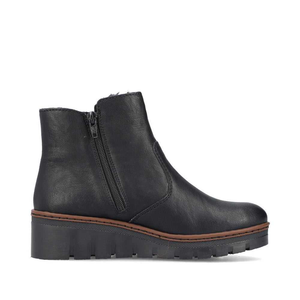 Rieker X9165-00 women's black side zip ankle boots, outer side view.