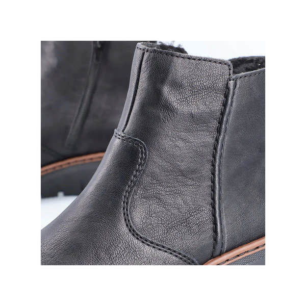 Rieker X9165-00 women's black side zip ankle boots, lifestyle view.