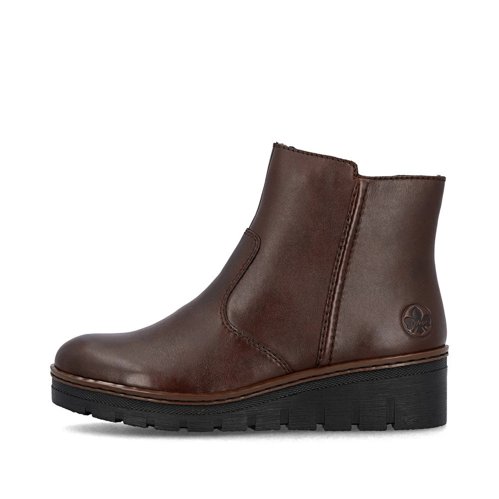 Rieker X9165-27 women's brown leather side zip ankle boots, inner side view.