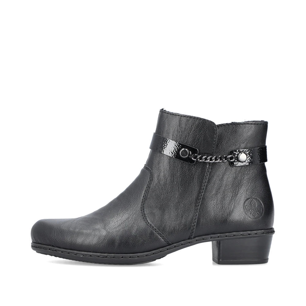 Rieker Y0783-00 women's black side zip ankle boots, inner side view.