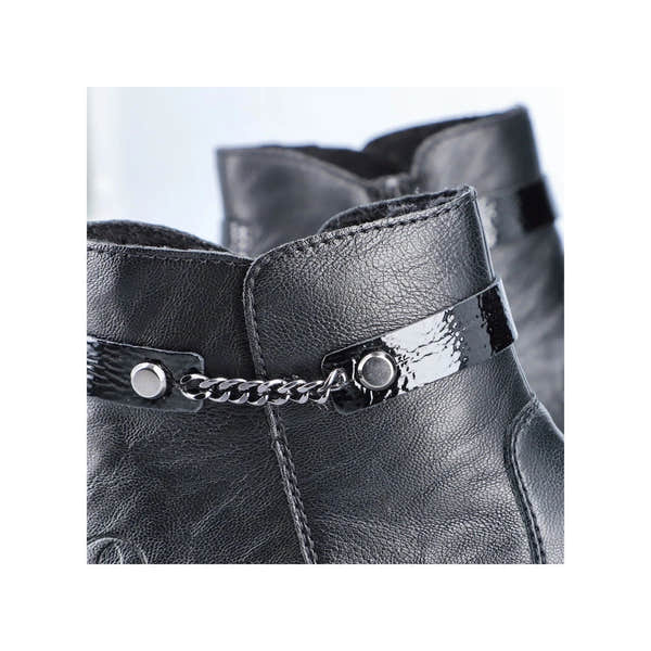 Rieker Y0783-00 women's black side zip ankle boots, lifestyle view.