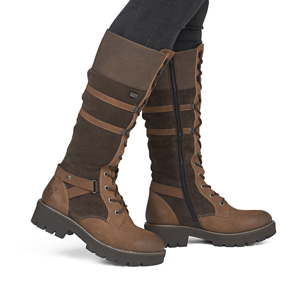 Rieker Y8101-25 women's brown suede water resistant zip & lace mid-calf boots, on-foot lifestyle view.