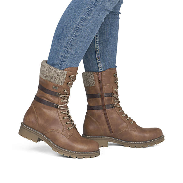 Rieker Y9107-24 women's brown water resistant zip & lace ankle boots, on-foot lifestyle view.