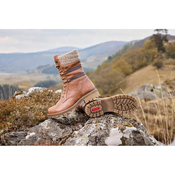 Rieker Y9107-24 women's brown water resistant zip & lace ankle boots, lifestyle view 1 of 3.