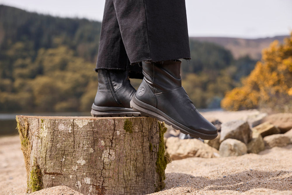 Rieker Z0066-00 women's black leather water resistant side zip ankle boots, lifestyle view 3 of 12.