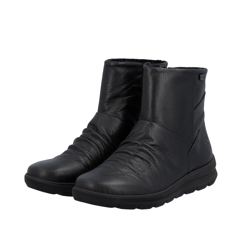 Rieker Z0066-00 women's black leather water resistant side zip ankle boots, lifestyle view 4 of 18.