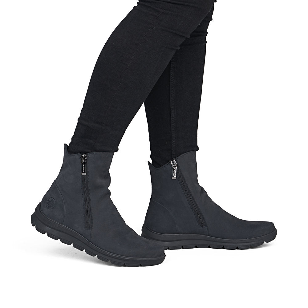 Rieker Z0068-14 women's navy suede side zip ankle boots, on-foot lifestyle view.