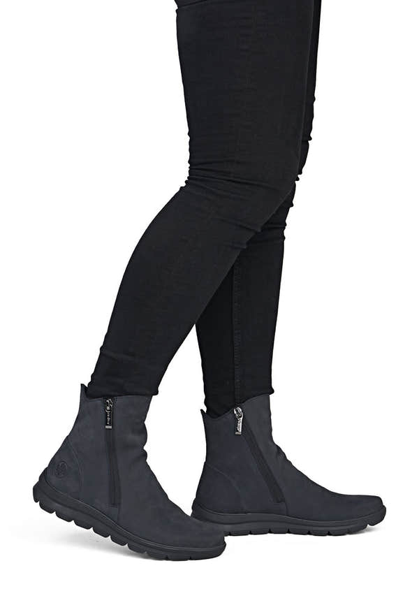 Rieker Z0068-14 women's navy suede side zip ankle boots, on-foot lifestyle view.