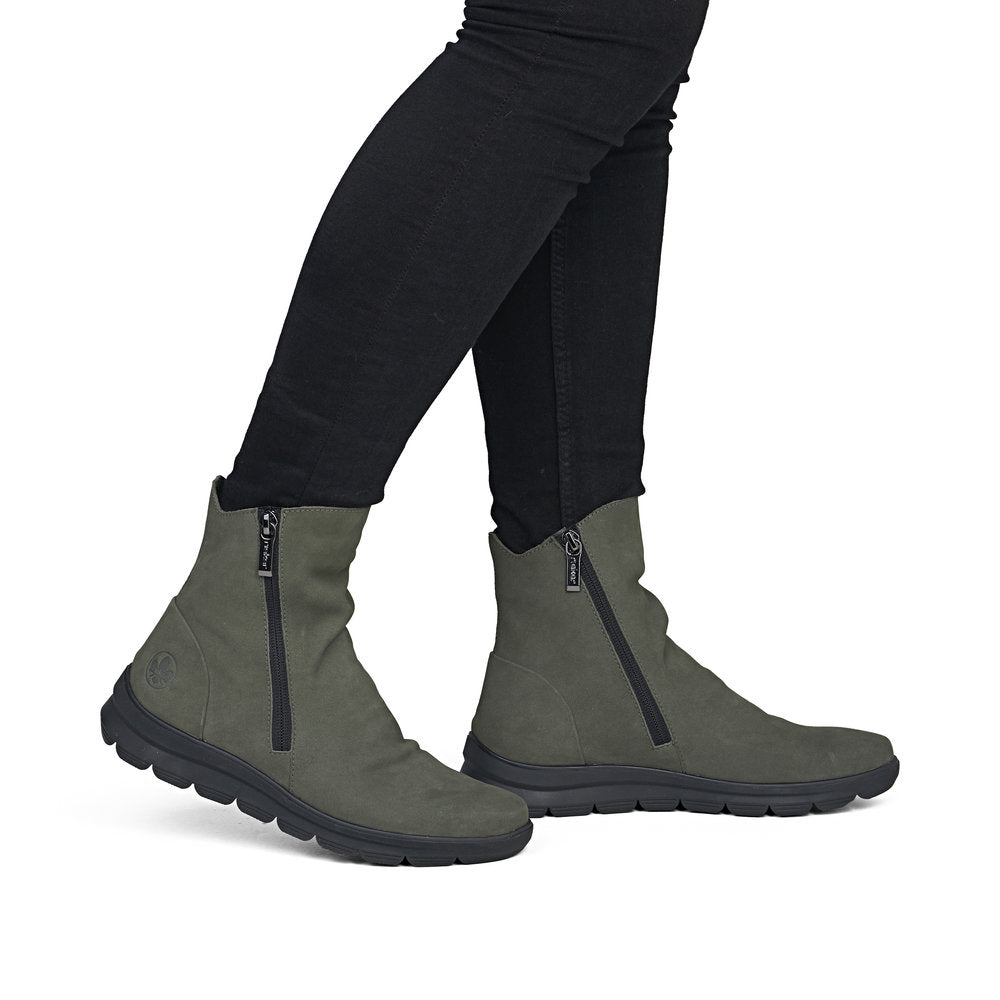 Rieker Z0068-54 women's green suede side zip ankle boots, on-foot lifestyle view.