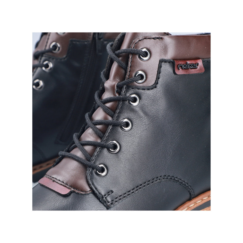 Rieker Z9340-00 women's black zip & lace ankle boots, lifestyle view.