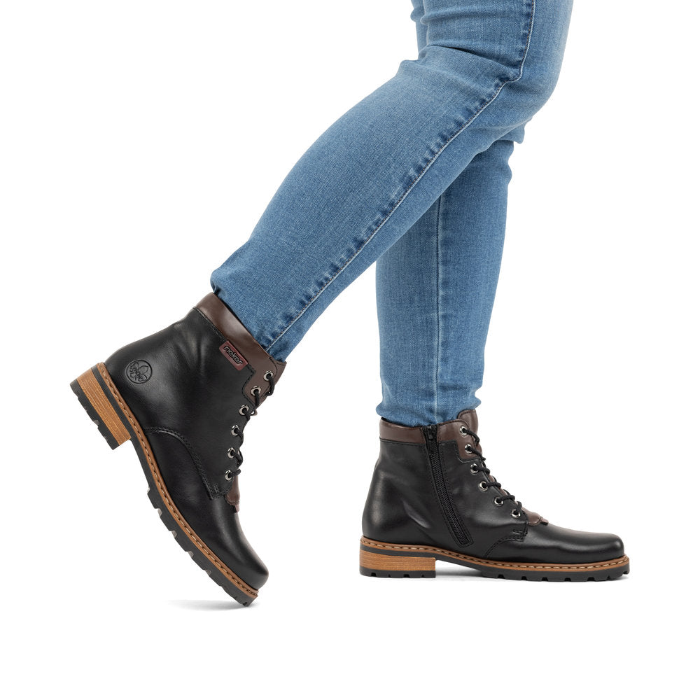 Rieker Z9340-00 women's black zip & lace ankle boots, lifestyle view 6 of 8.