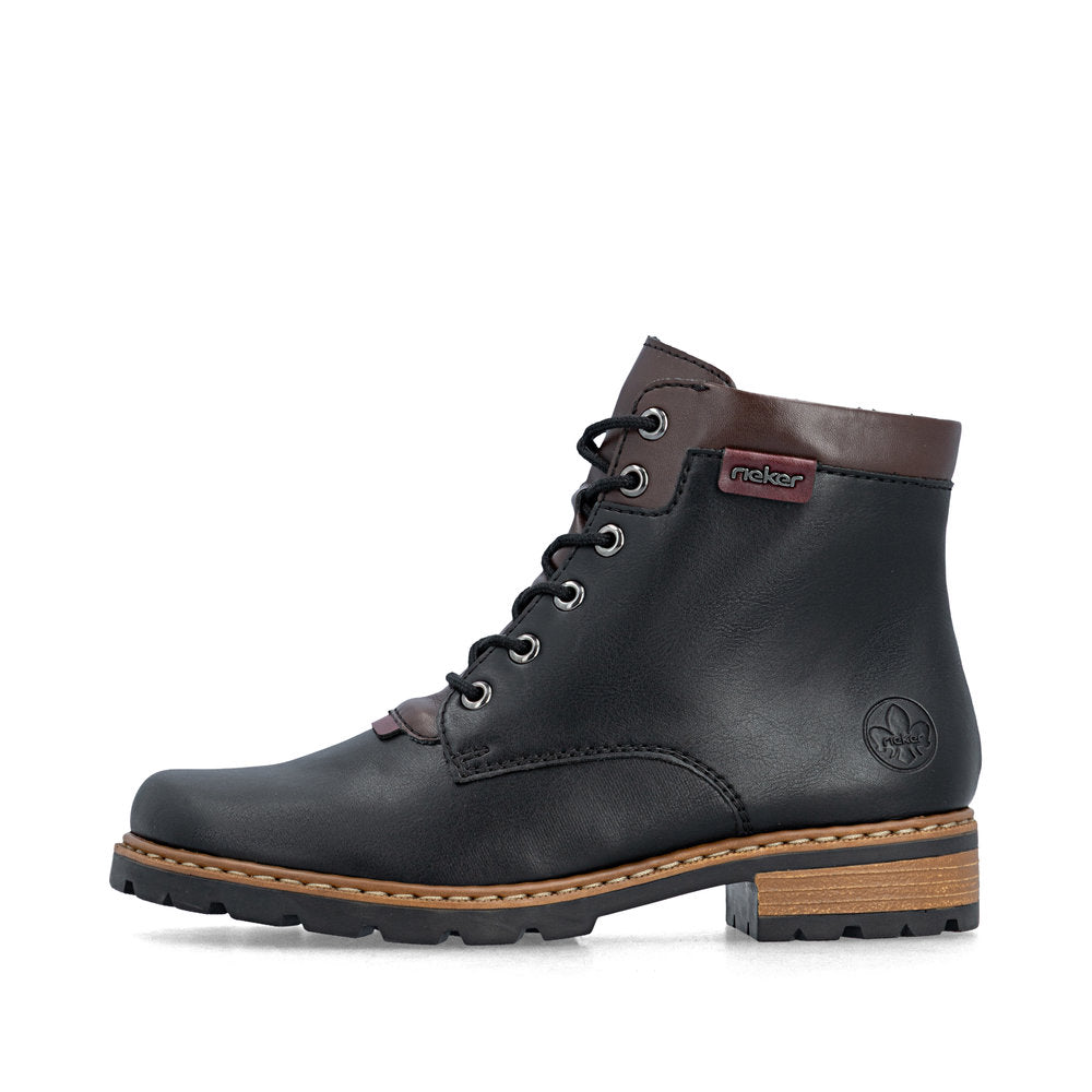 Rieker Z9354-00 women's black side zip ankle boots, inner side view.