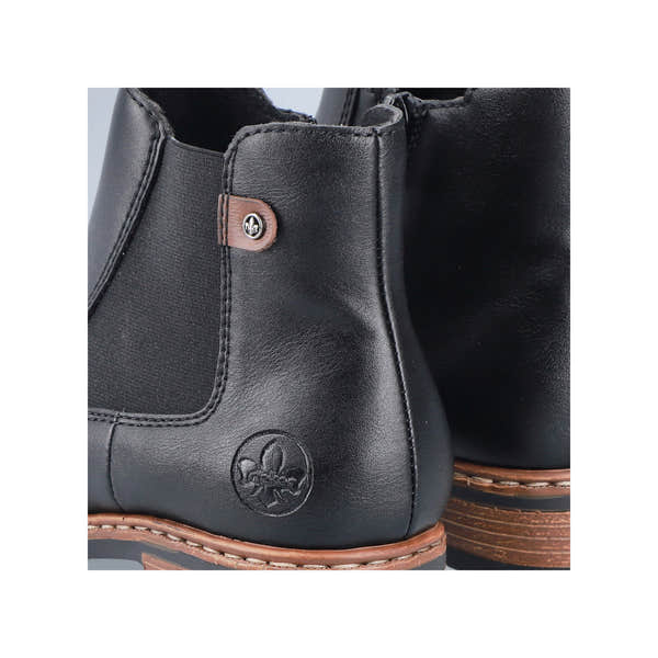 Rieker Z9354-00 women's black side zip ankle boots, lifestyle view.