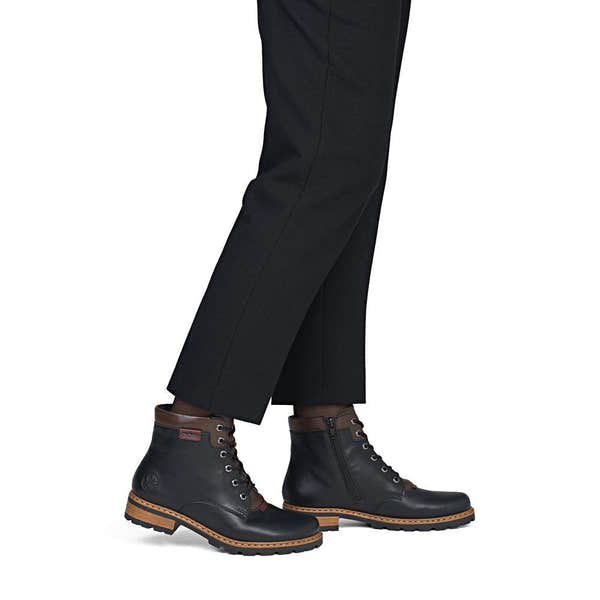 Rieker Z9354-00 women's black side zip ankle boots, on-foot lifestyle view.